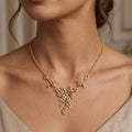 Golden Fleur-de-Lis Vine Necklace – Delicate Pavé Crystal Floral Pendant