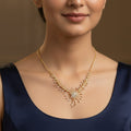 Solaris Sunburst Gold Necklace – Sparkling Floral Motif Pendant